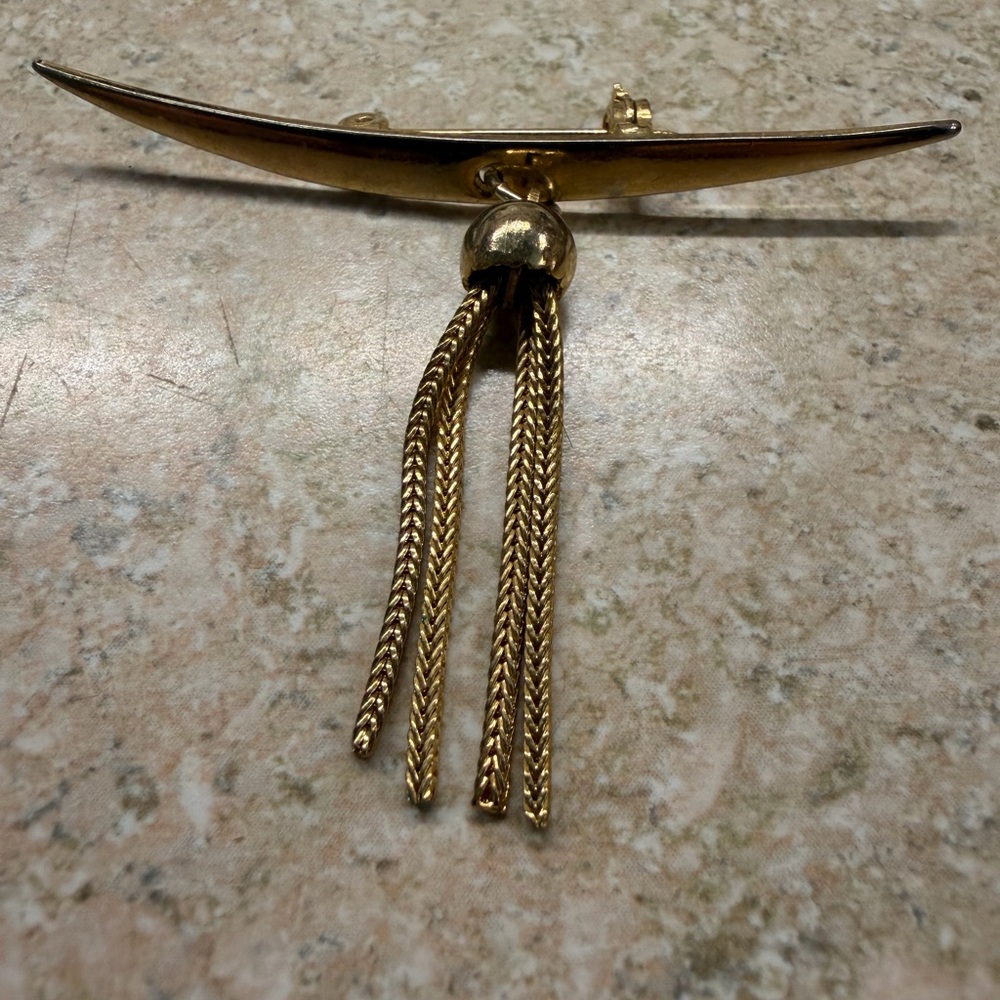 Elegant Gold Tassel Brooch